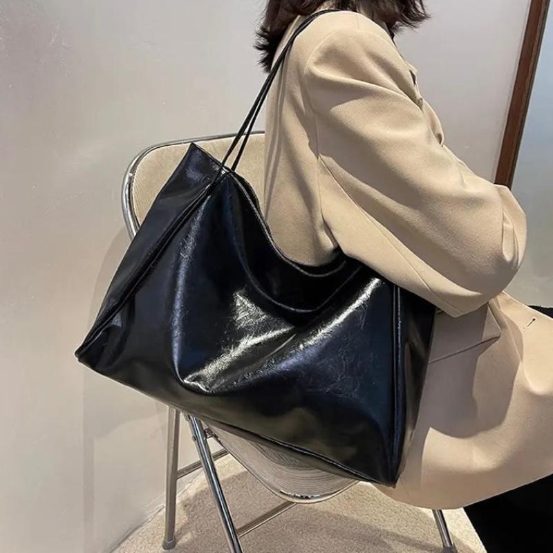 Paula | Glänzende Ledertasche