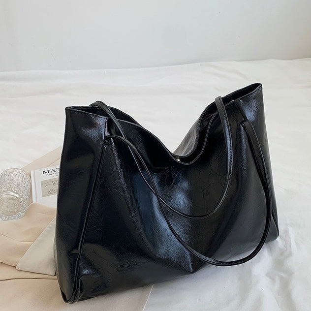 Paula | Glänzende Ledertasche