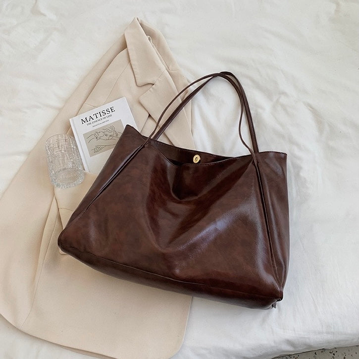 Paula | Glänzende Ledertasche